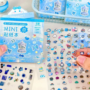 Carnet de stickers scrapbooking bleu : mini autocollants océan et hiver à effet brillant