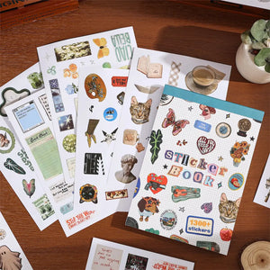 Détail pages livre stickers scrapbooking : sculptures grecques, chats, plantes, citations rétro