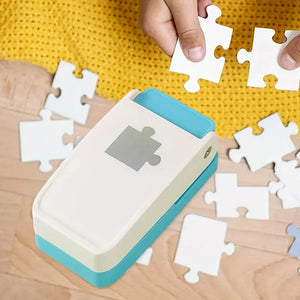 Perforatrice pièce de puzzle blanche et pièces découpées assemblées à la main