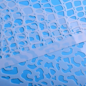 Pochoir motifs léopard et écailles pour textures de fond scrapbooking