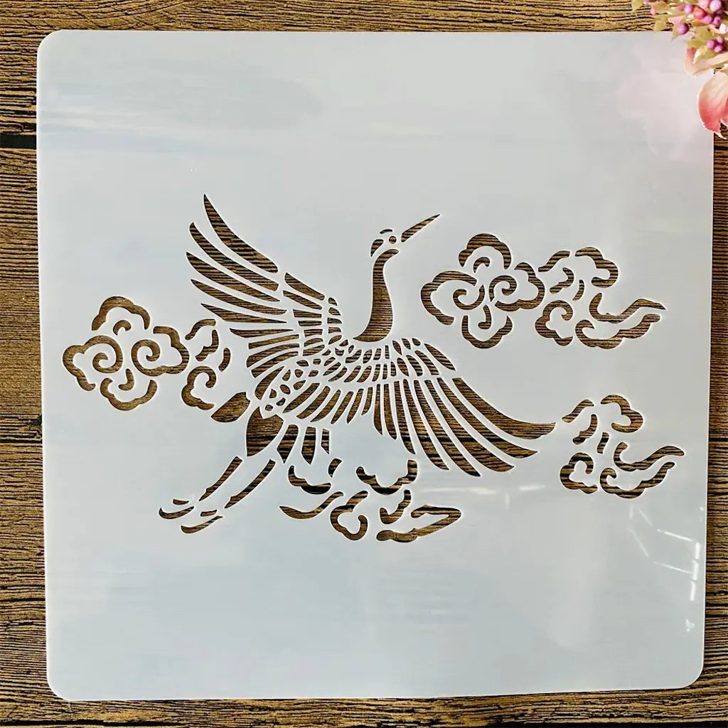 Grand pochoir oiseau en vol majestueux avec nuages stylisés pour scrapbooking artistique