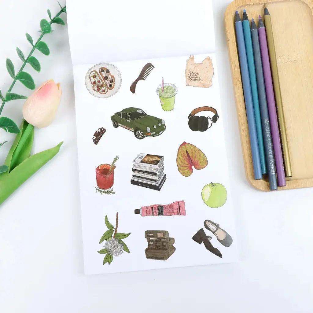 Page livre stickers esprit Sofia Coppola : Porsche 911, Aesop, Polaroid, ballerines à bride, anthurium