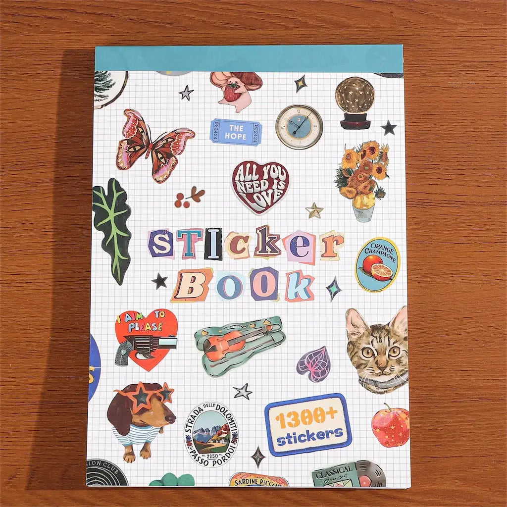 Livre stickers scrapbooking couverture bleue, sticker book lettrage coupures de presse années 2000