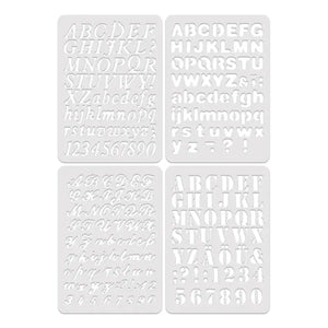 Plan rapproché de quatre planches pochoirs alphabet aux polices italique et bâton