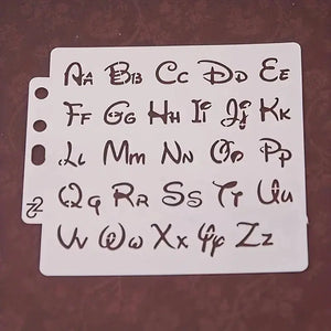 Pochoir alphabet style Disney bicasse, lettres cursives ondulées planche A6 ajourée perforée