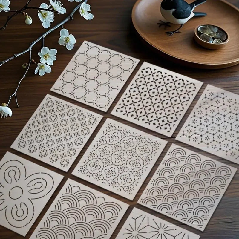Pochoir Broderie vue d'ensemble neuf planches motifs