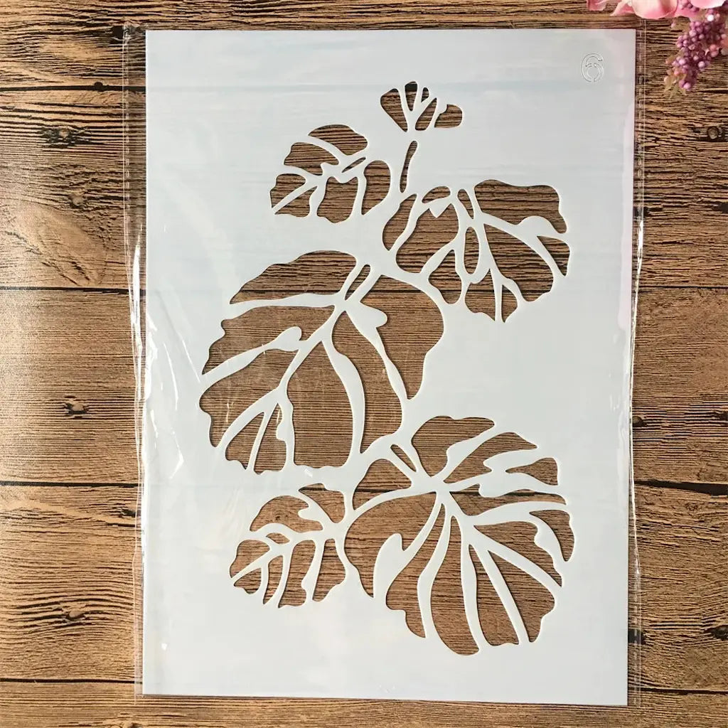 Pochoir feuille large monstera trois grandes feuilles palmées découpées, format vertical ajouré