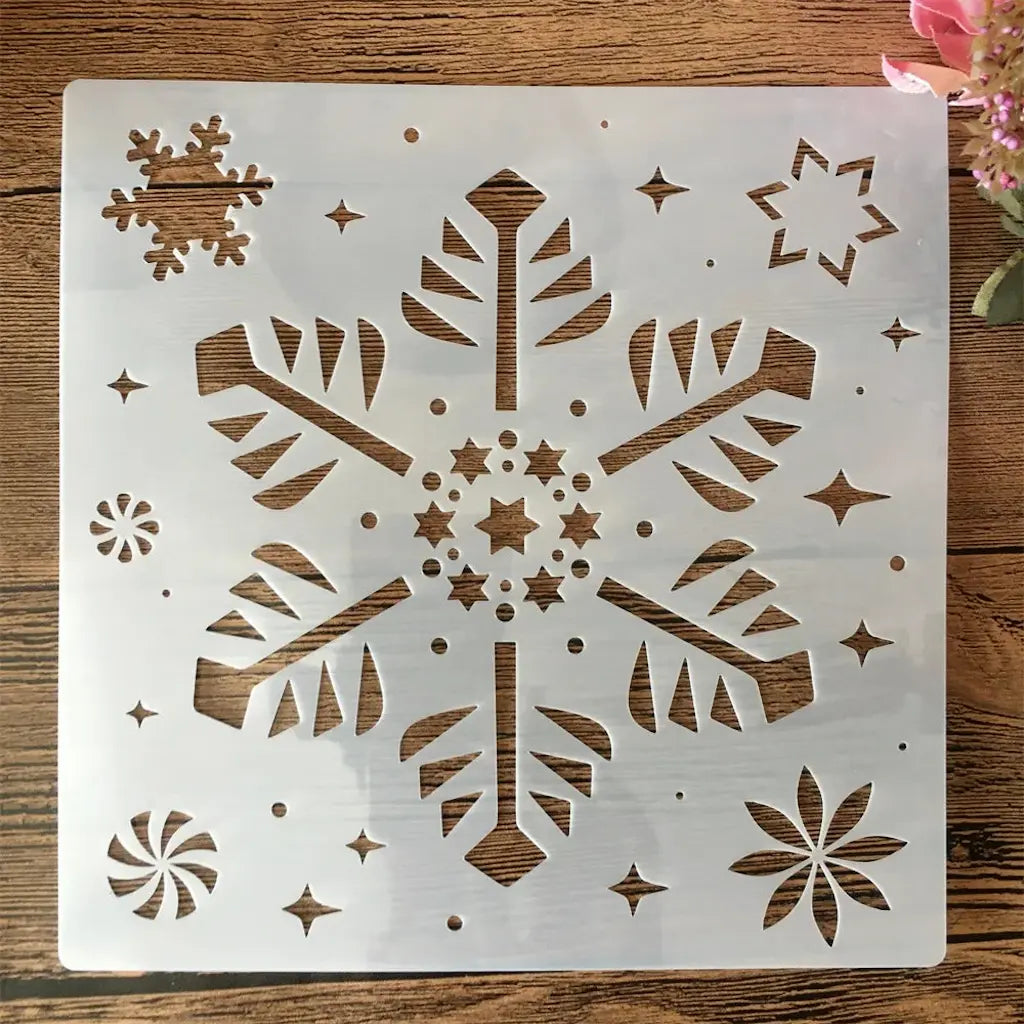 Pochoir flocon de neige motif rayé central rond, étoile à six branches et fleur en coin