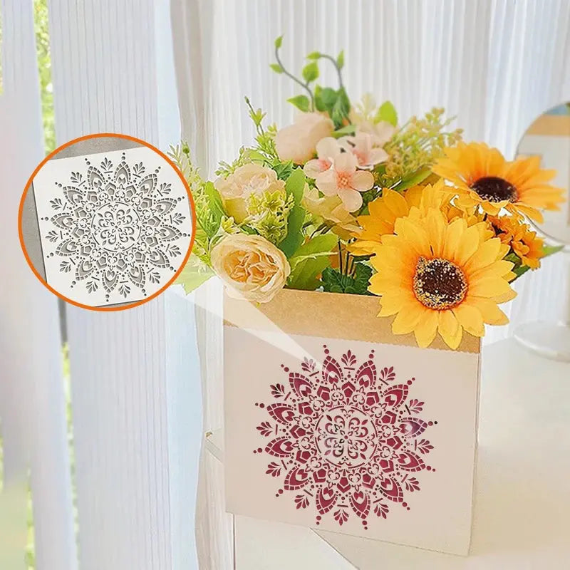 Pochoir Gyroscope rose appliqué sur boîte à fleurs en papier