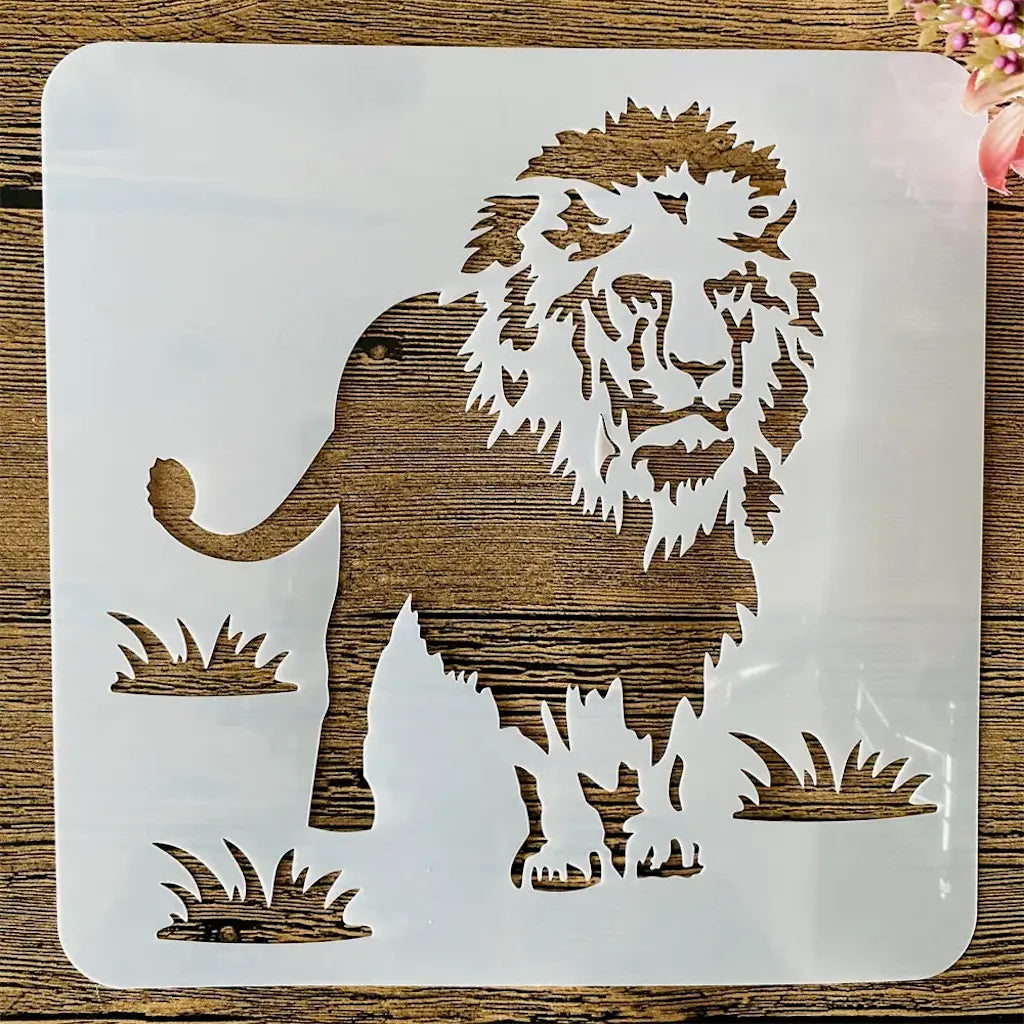 Pochoir lion debout avec crinière hérissée et touffes d'herbe pour scrapbooking savane