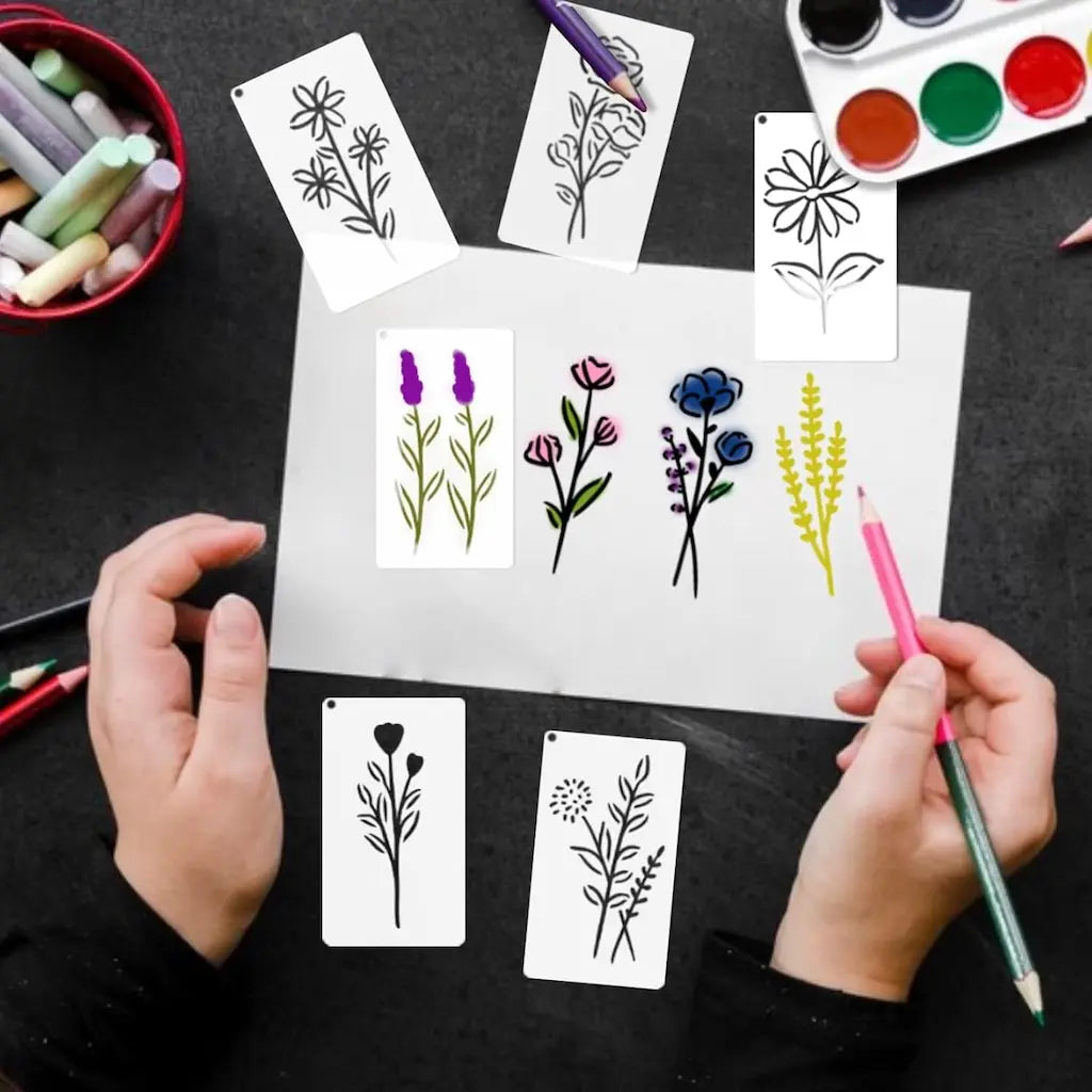 Pochoir lot fleurs démonstration : 6 fleurs colorées lavande rose bleu jaune au crayon papier