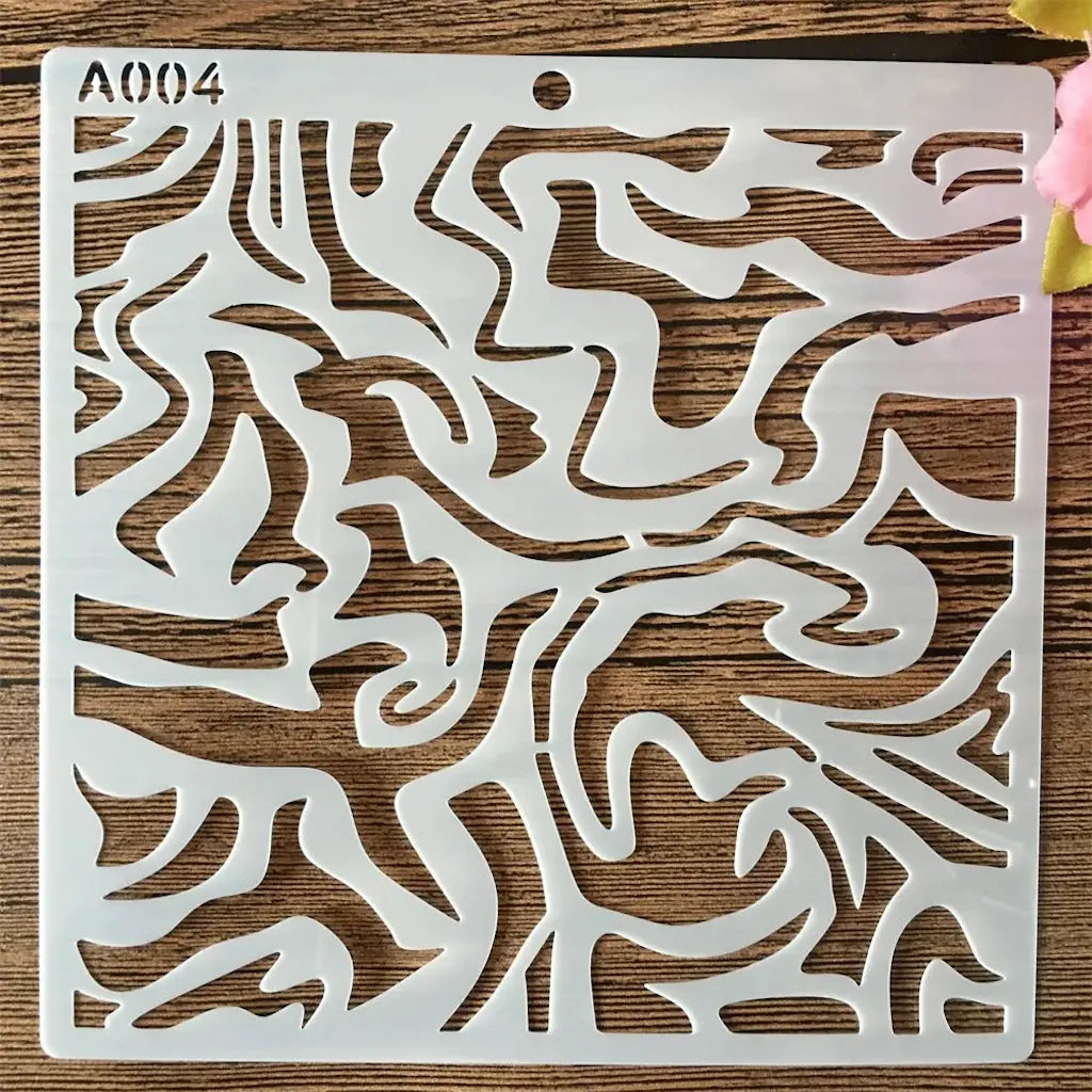 Pochoir motif vagues abstraites pour fond fluide en scrapbooking