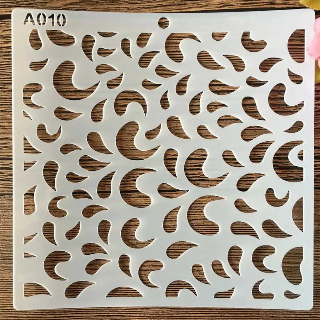 Pochoir motif cachemire en gouttes pour fond ornemental de scrapbooking