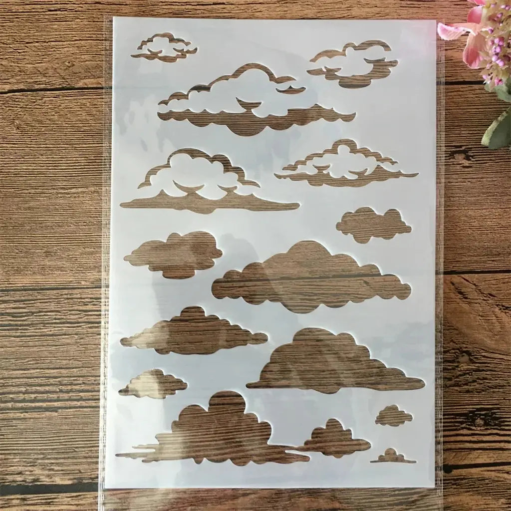 Pochoir nuage planche 14 nuages cumulus stylisés, tailles variées ciel format vertical ajouré