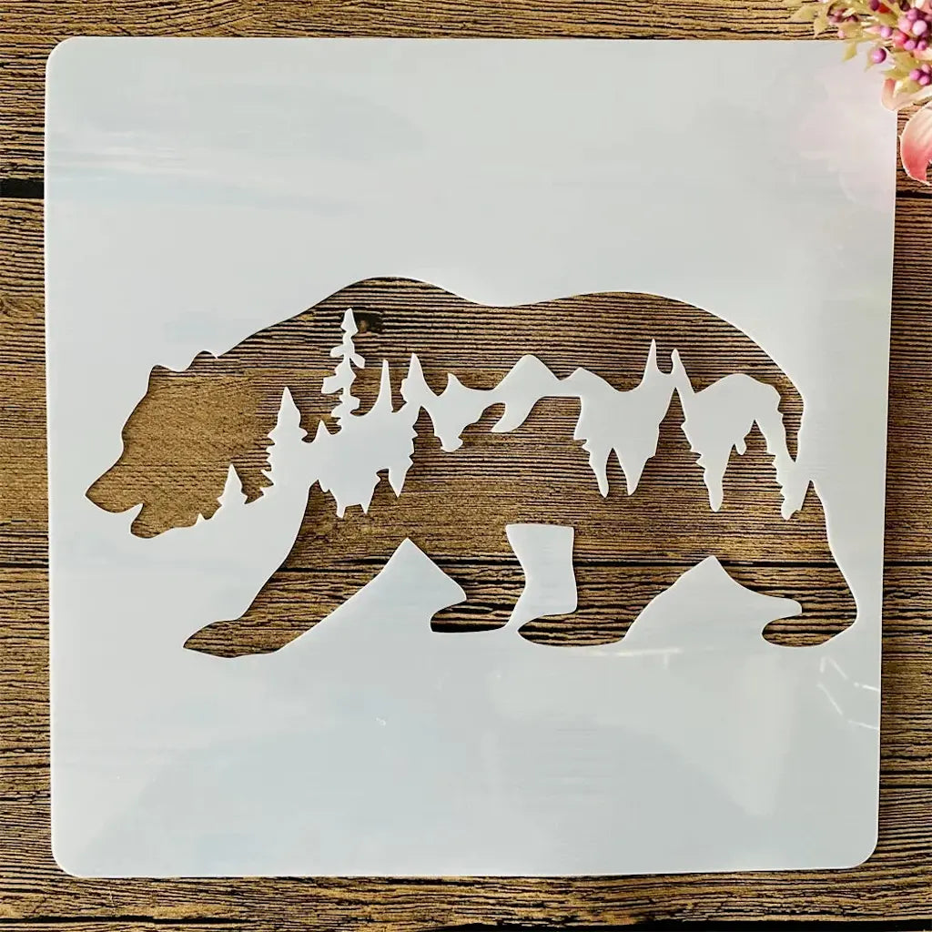 Pochoir ours silhouette avec forêt de sapins et montagne intégrées pour scrapbooking nature