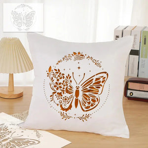 Pochoir Papillon Fleur appliqué en orange sur housse de coussin