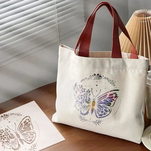 Pochoir Papillon Fleur en bleu et violet sur sac en toile