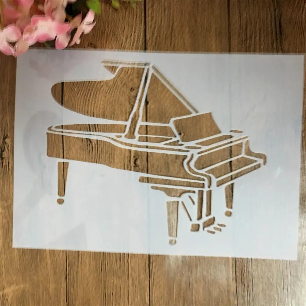 Pochoir piano à queue de profil clavier visible, pédales et pieds élancés format ajouré bois