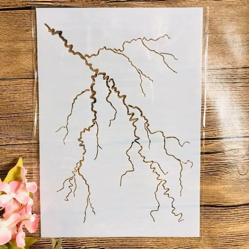 Pochoir racine arbre ramifié filaments retombants, lignes ondulées délicates fond bois