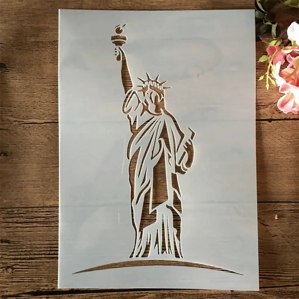 Pochoir Statue de la Liberté flambeau levé et couronne, drapé détaillé format A4 ajouré bois