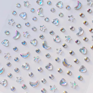Détail planche strass cristal iridescent scrapbooking : étoiles, lunes, cœurs, ronds