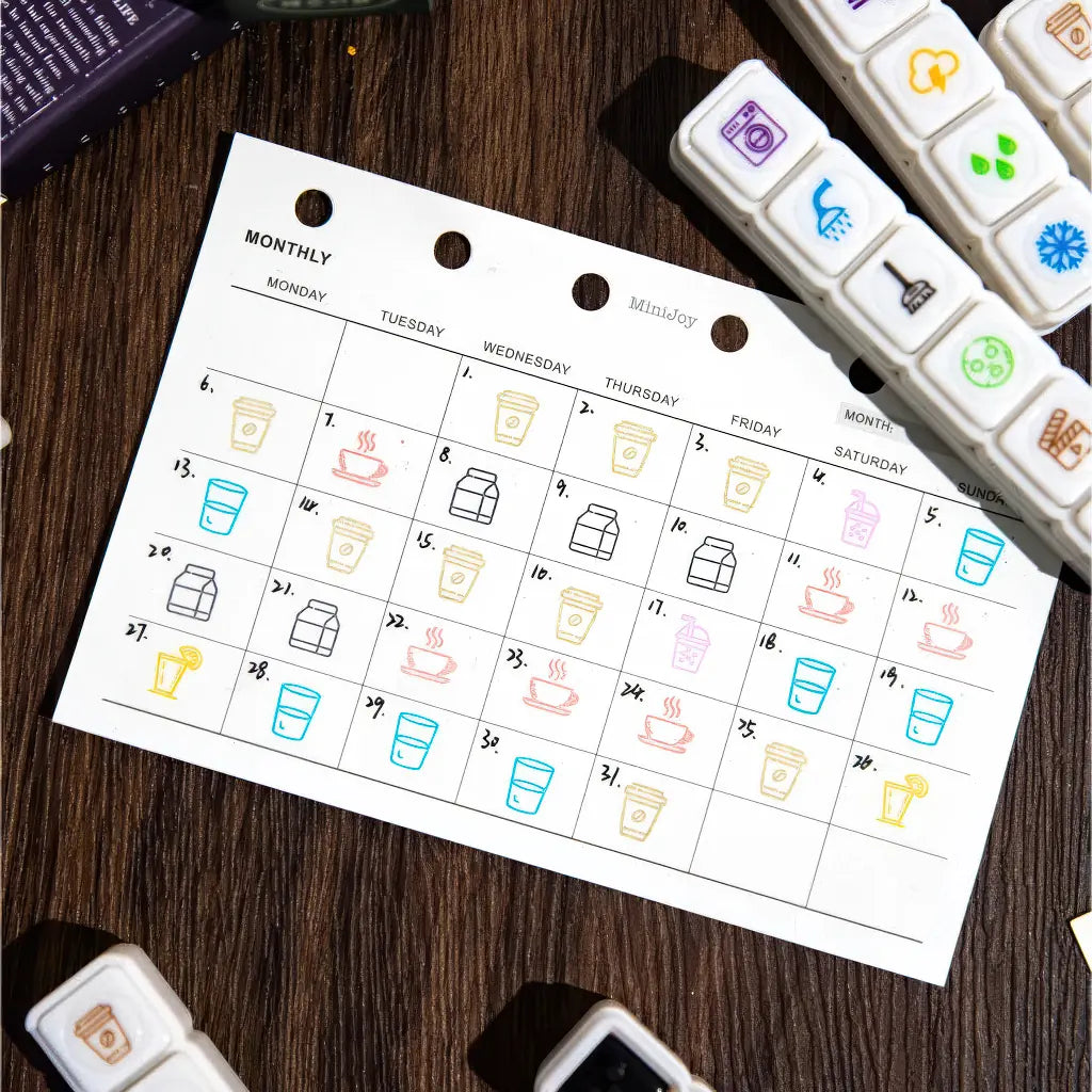 Tampon scrapbooking École, pictos boissons remplissant un calendrier mensuel
